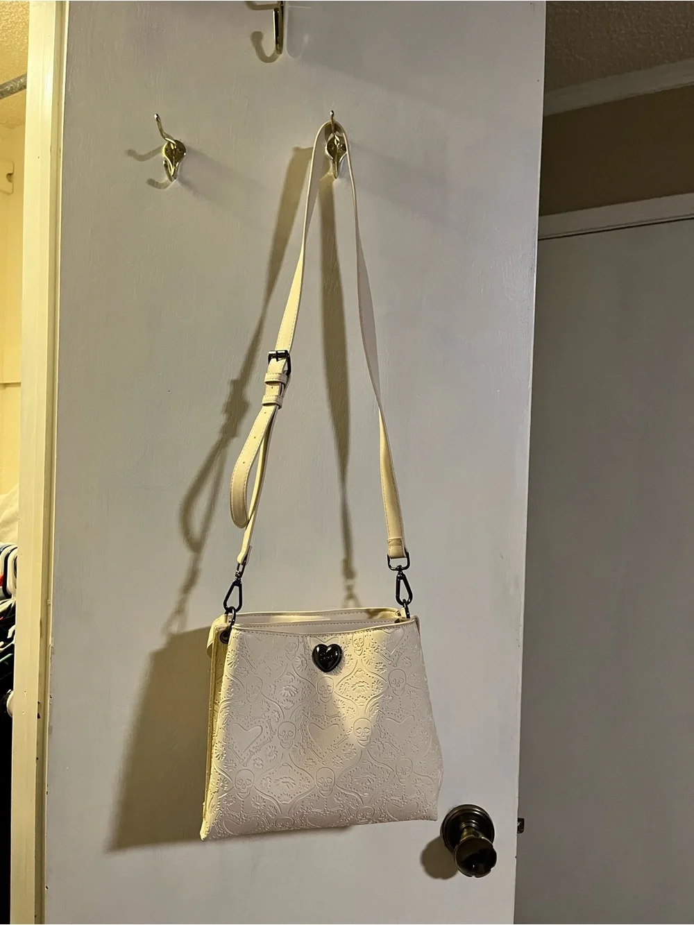 Betsey Johnson Cream Embossed Crossbody with Black Heart Accent